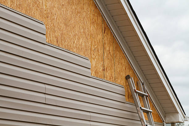 Professional Storm Damage Siding Repair technician working in Indian Hills, TX